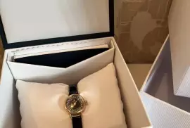 Часы наручные женские золотые